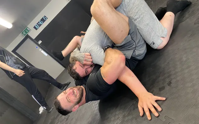 Grappling on the mats at Stewart Martial Arts & Fitness